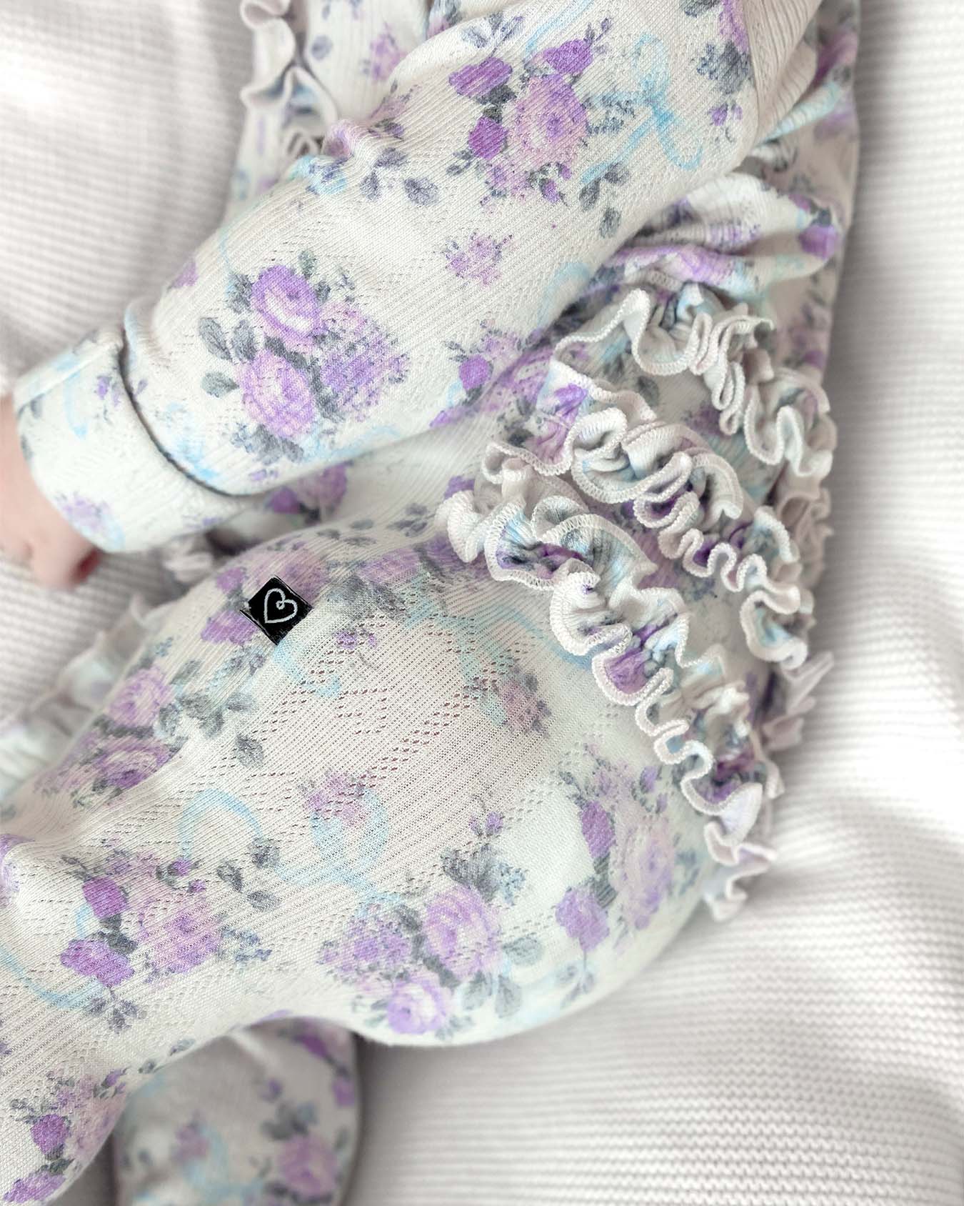 Etta Pointelle Ruffled Zippered Footie